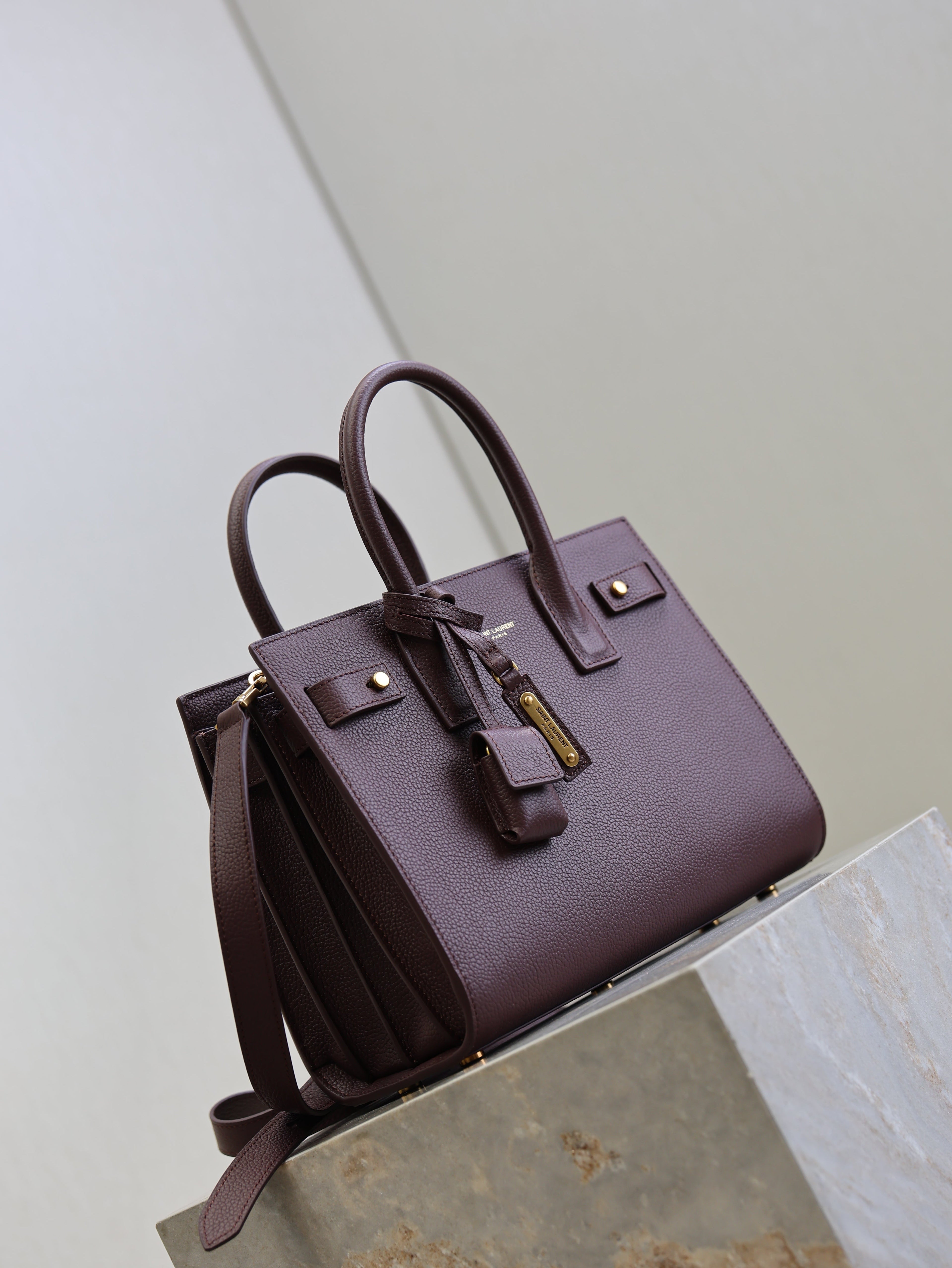YSL 25S SAC DE JOUR MM 26 IN ROUGE CABERNET SUPPLE GRAINED CALFSKIN